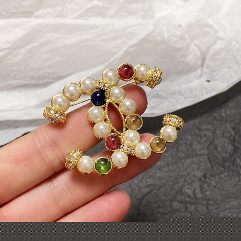 Ch*el brooches